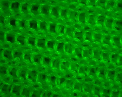 Monster Silk(TM) Knitted Textile Magnified 84x Under Green Filter